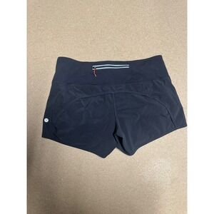 Lululemon Hotty Hot Shorts Black Reflective Stripe Zipper Pockets Women's Size 8